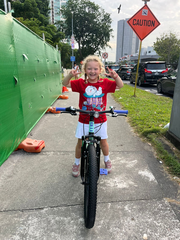 6 year old kiwi, AJ bikes 128km around Singapore raising funds for kids in Cambodia